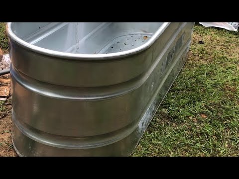 Transforming Galvanized metal troughs into raised beds