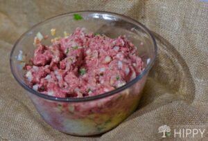 ground meat with everything added including the parsley