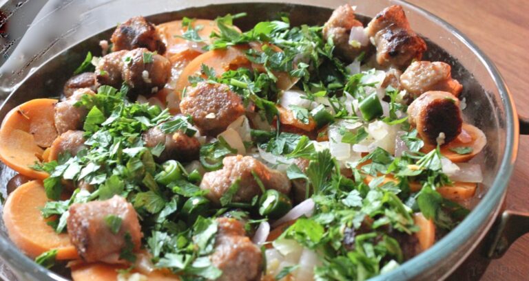 parsley scattered on top of sausage frittata