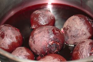 boiled beetroots in saucepan