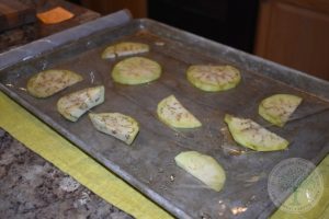 eggplant slices on cookie sheet and tray