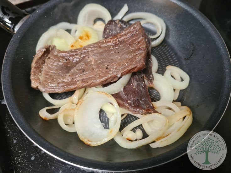 soft jerky in frying pan with onion