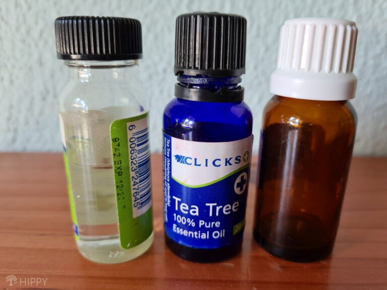 tea tree oil in blue and amber bottles