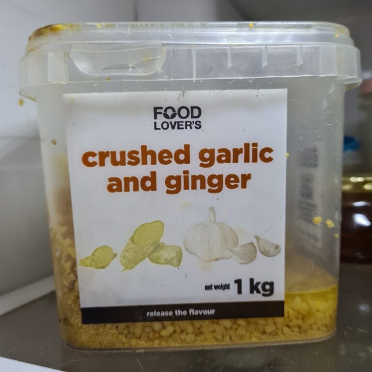 crushed garlic and ginger in tupperware box