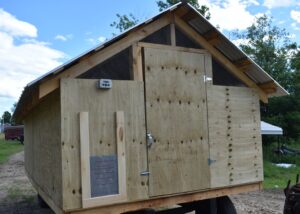 large chicken coop with automatic door