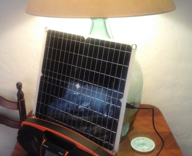 small solar panel charging indoor from a lamp