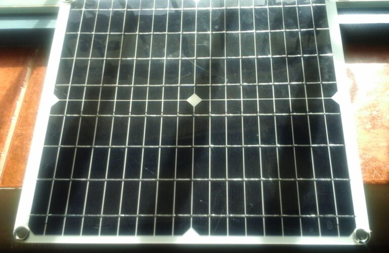 small solar panel on windowsill