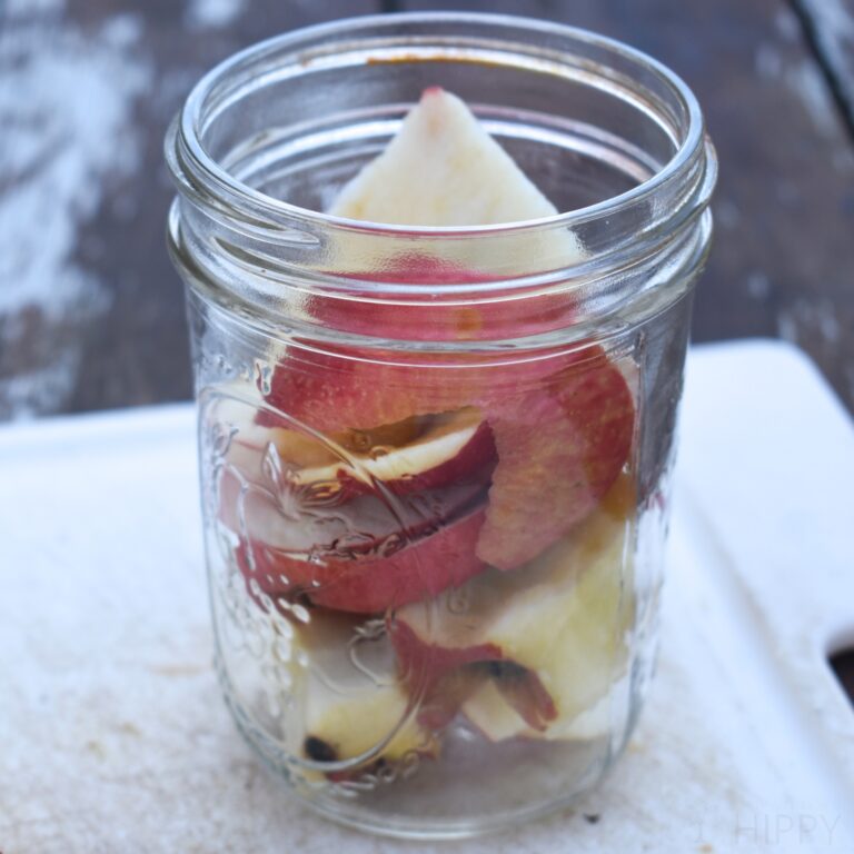 apple peels and cores in glass jar