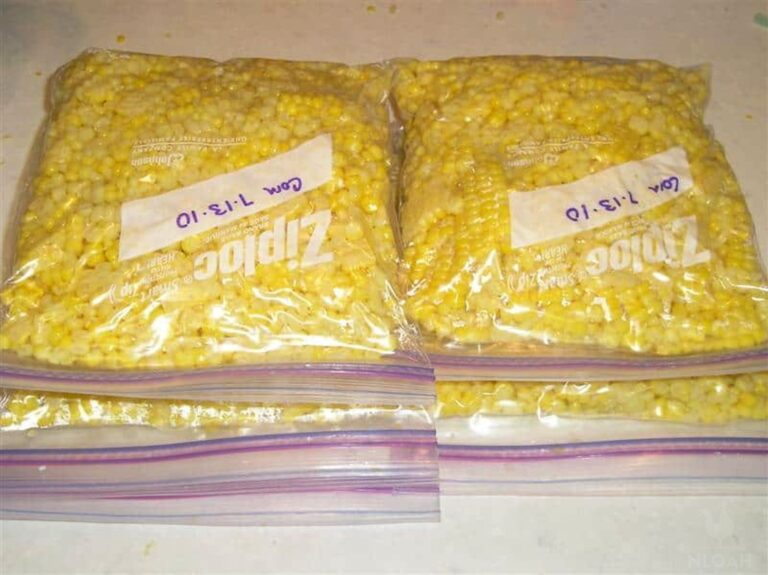 four Ziploc bags of frozen corn kernels
