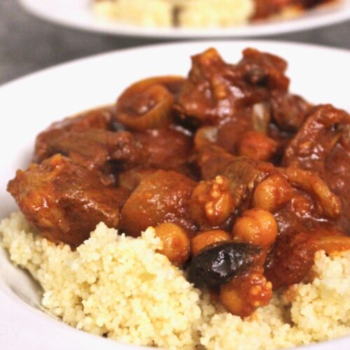 lamb tagine with apricots and almonds served with couscous