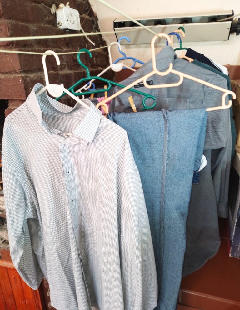 shirts and jeans hang-drying indoors