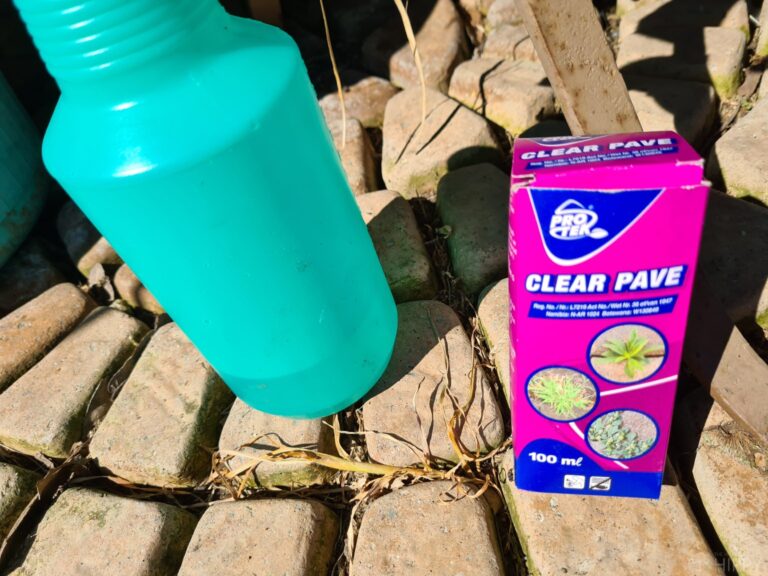 clear pave herbicide and a plastic bottle