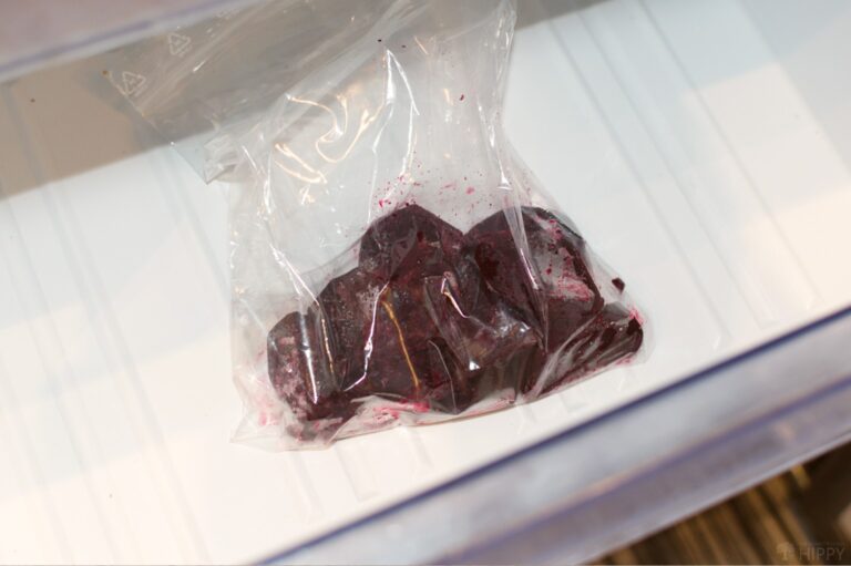 frozen beets in containers in the freezer