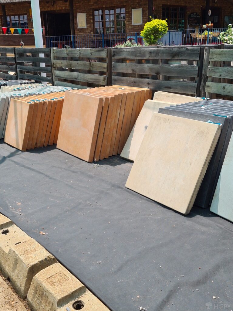stacked paving stores of various sizes to be used to make garden pathways