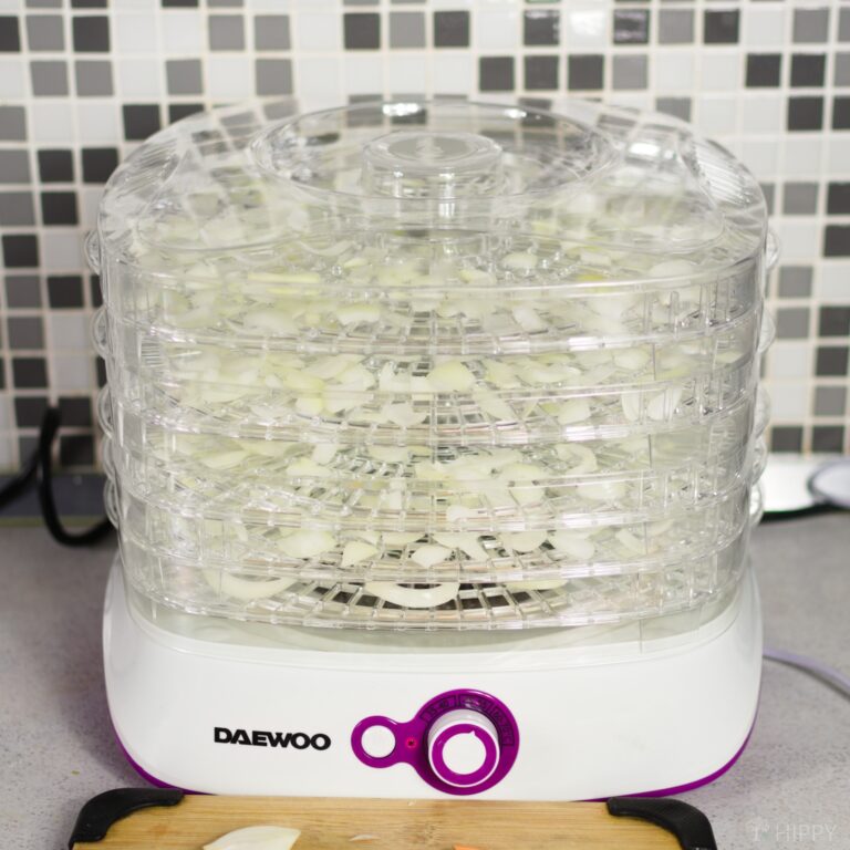 dehydrator filled with chopped onions