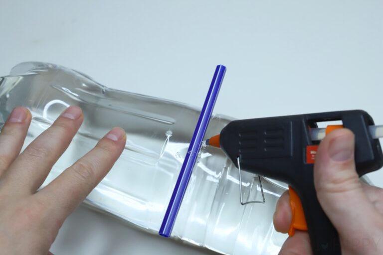 gluing pen to plastic bottle
