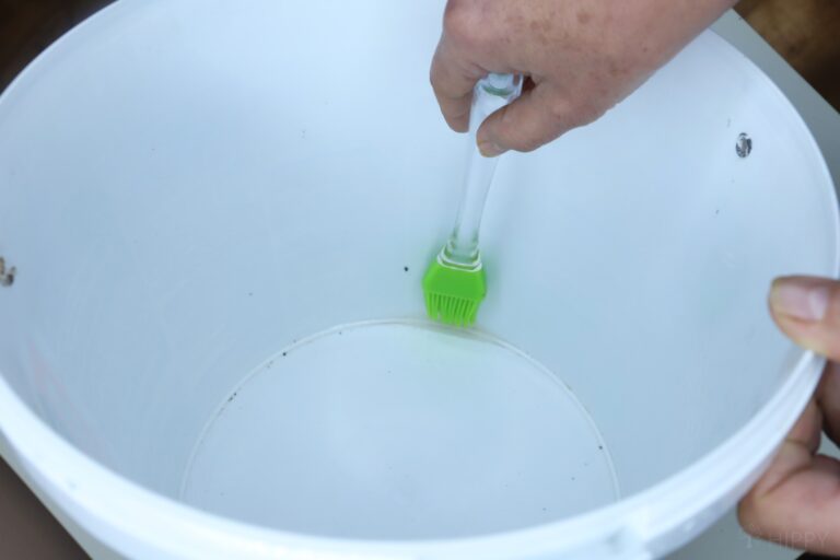 oiling inside of plastic bucket