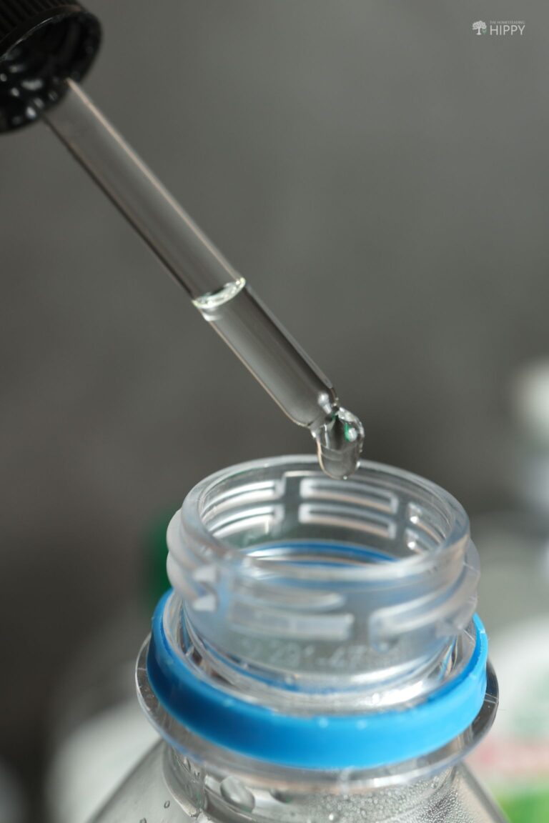 adding essential oil to fly spray mix