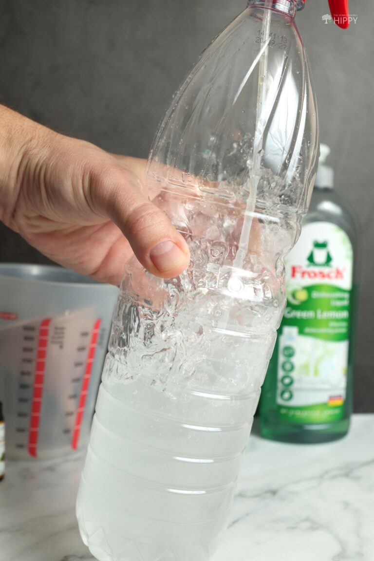 mixing fly spray in bottle