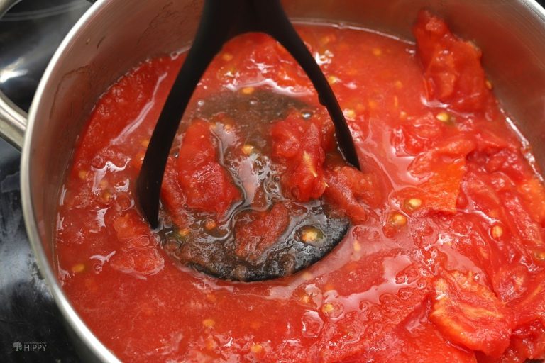 crushing tomatoes