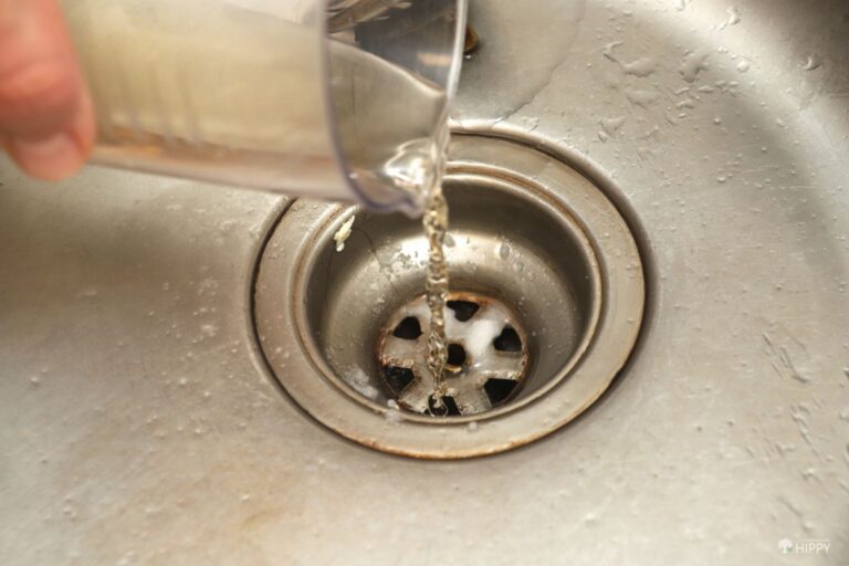pouring ACV in sink drain