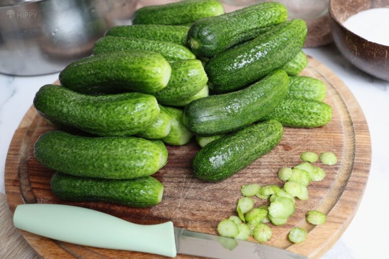 washed cucumbers on cutting board